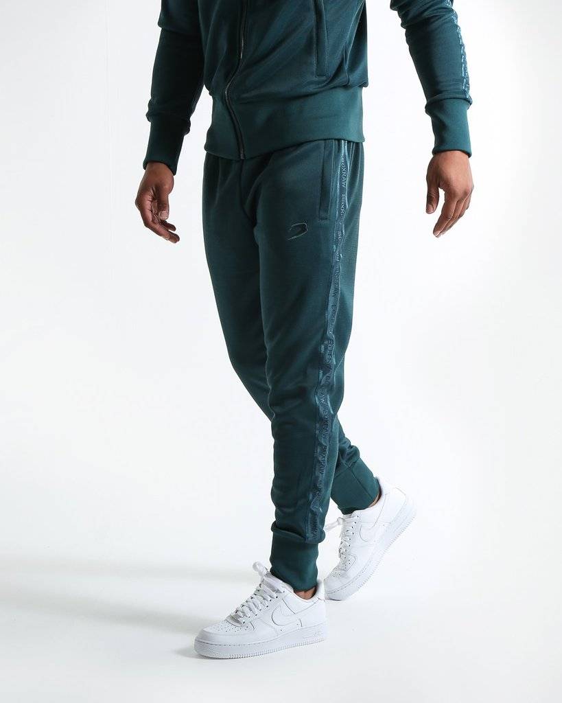 Dark green Nike tracksuit.