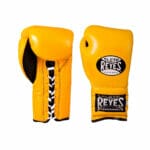 Cleto Reyes traditional boxing gloves in brilliant yellow color on a white background.