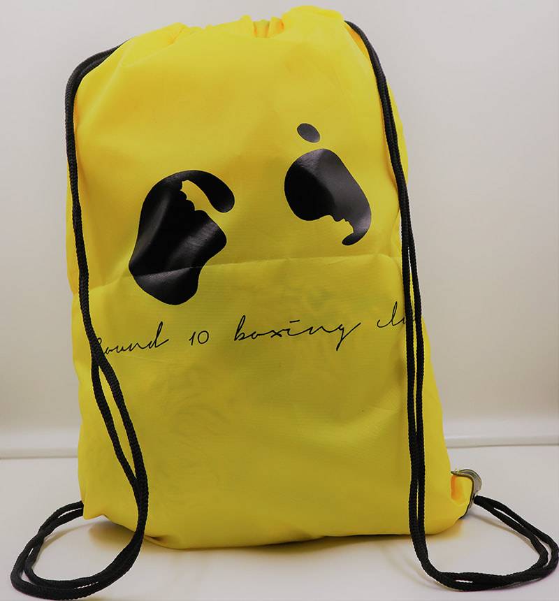 A promotional bag with a panda face on it.