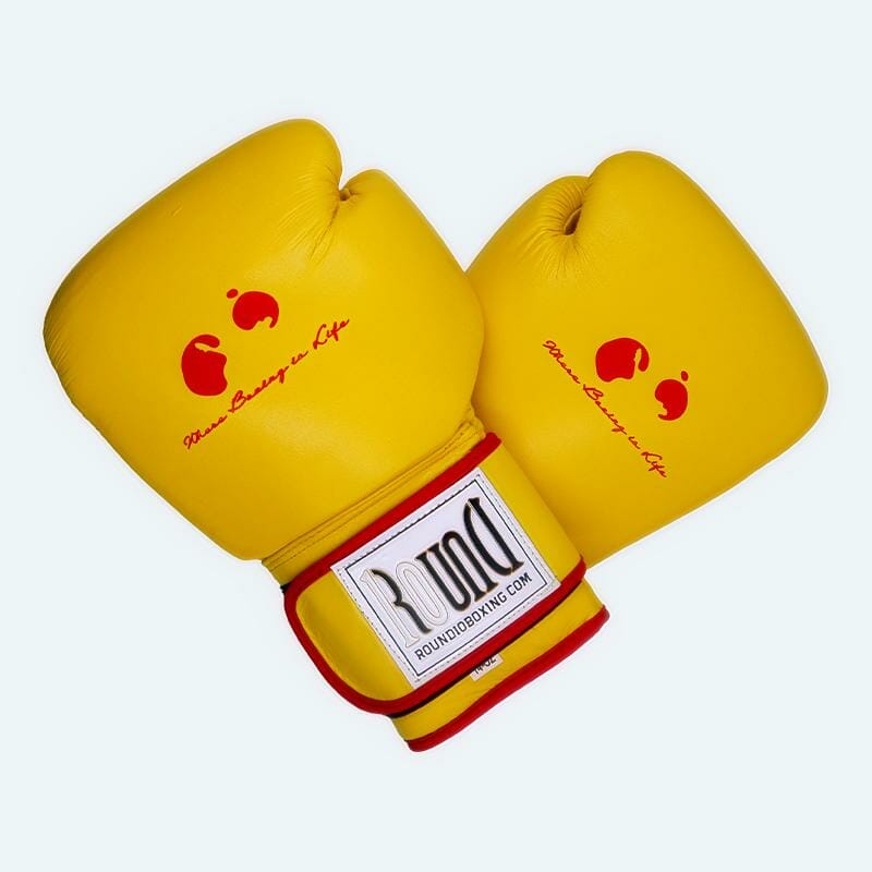 Yellow boxing gloves on a white background, 12 oz.