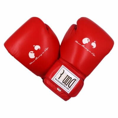 Two round red 12 oz boxing gloves on a white background.