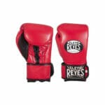 A pair of red boxing gloves on a white background featuring Cleto Reyes brand.